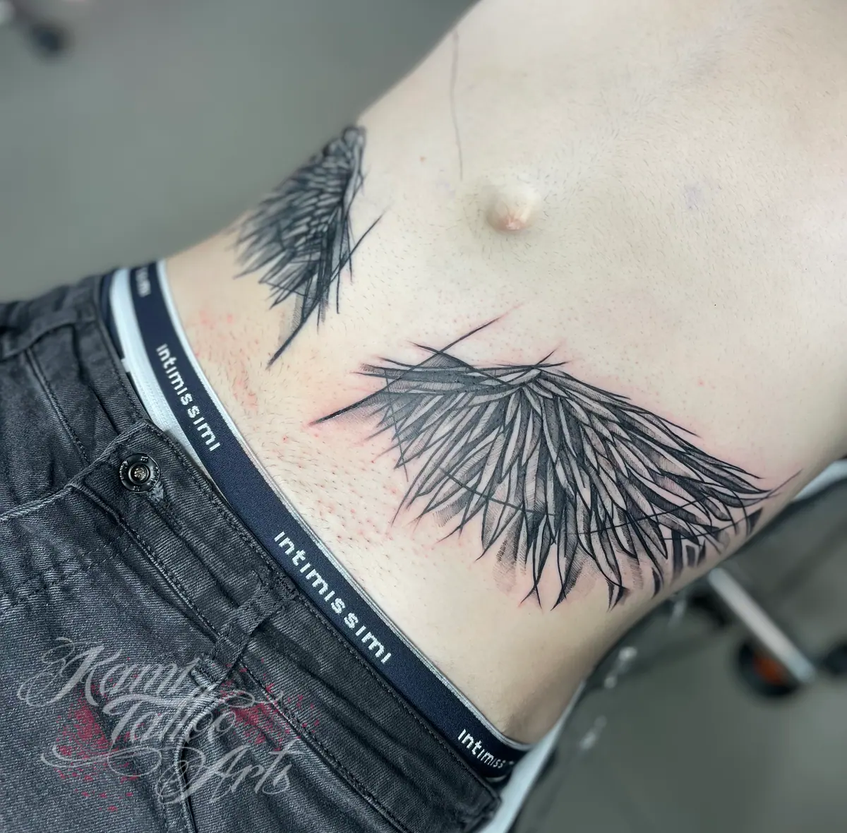 Sketch Style Wings Hips Blackwork Tattoo