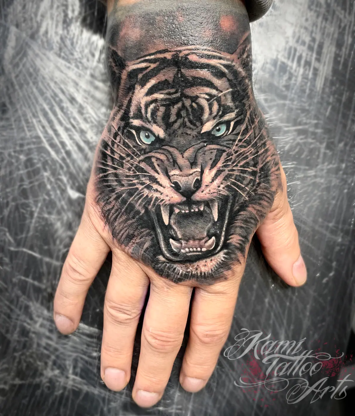 Tiger Hand Tattoo